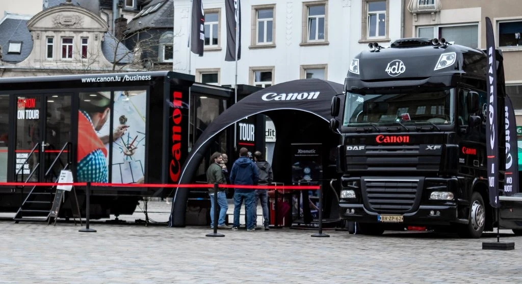 Branded Airdome in front of a promotion truck